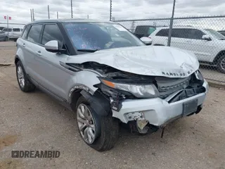 2014 Land Rover Range Rover Evoque Pure z VIN SALVN2BG0EH936165, wystawiony jako IAAI lot #41958239 z przebiegiem 154 733 mil mil oraz . Historia ofert i sprzedaży dostępna na DreamBid. Obrazek 1.