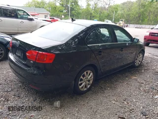 2014 Volkswagen Jetta SE z VIN 3VWD17AJ2EM273523, wystawiony jako IAAI lot #42360638 z przebiegiem 124 583 mil mil oraz . Historia ofert i sprzedaży dostępna na DreamBid. Obrazek 4.