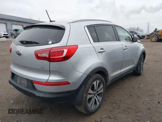 2011 Kia Sportage EX with VIN KNDPC3A25B7051396, listed as a IAAI auction lot 38855292 with 263,407 mi miles and . Bid and sale history available at DreamBid. Image 4.