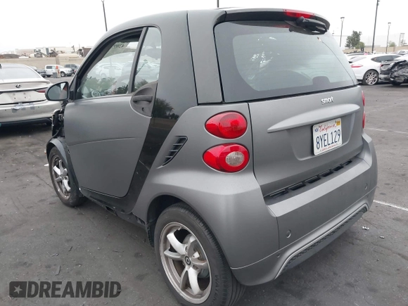 2015 Smart fortwo Passion with VIN WMEEJ3BA1FK787744, listed as a IAAI auction lot 42095001 with 43,370 mi miles and . Bid and sale history available at DreamBid. Image 3.