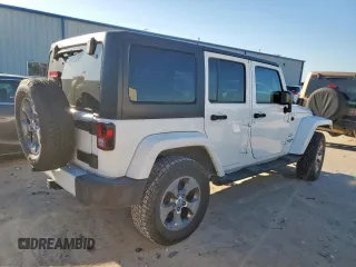 2016 Jeep Wrangler Unlimited Sahara z VIN 1C4HJWEG6GL218719, wystawiony jako Copart lot #56065235 z przebiegiem 96 061 mil mil oraz Szkoda całkowita • Salvage title. Historia ofert i sprzedaży dostępna na DreamBid. Obrazek 3.