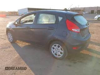 2013 Ford Fiesta S with VIN 3FADP4TJ8DM132523, listed as a IAAI auction lot 41700402 with 53,835 mi miles and . Bid and sale history available at DreamBid. Image 3.