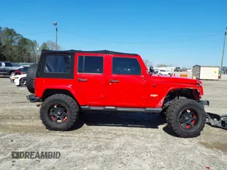 2015 Jeep Wrangler Unlimited Sahara with VIN 1C4BJWEG1FL748732, listed as a IAAI auction lot 41779308 with 109,986 mi miles. Bid and sale history available at carsss.com. Image 14.