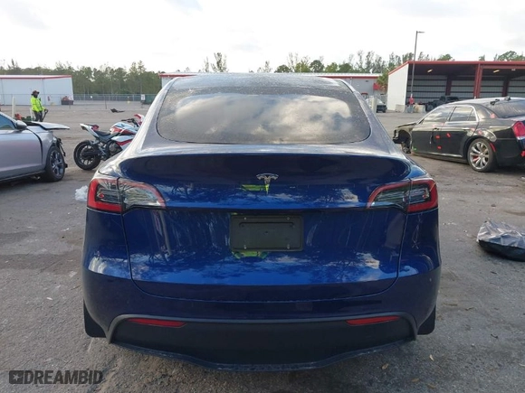 2024 Tesla Model Y with VIN 7SAYGDED5RF015208, listed as a IAAI auction lot 41608087 with NaN miles. Bid and sale history available at carsss.com. Image 16.
