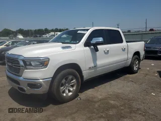 2023 Ram 1500 Laramie with VIN 1C6SRFJT1PN655637, listed as a Copart auction lot 60497045 with 30,283 mi miles and Salvage title. Bid and sale history available at DreamBid. Image 1.