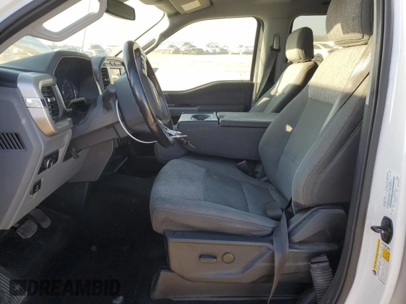 2021 Ford F-150 XL with VIN 1FTEW1CP8MFD11312, listed as a Copart auction lot 88754605 with 142,224 mi miles and Salvage title. Bid and sale history available at DreamBid. Image 7.