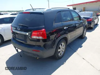 2013 Kia Sorento LX with VIN 5XYKT3A64DG363163, listed as a IAAI auction lot 42811435 with 199,427 mi miles and . Bid and sale history available at DreamBid. Image 4.