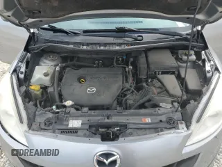 2012 Mazda 5 Sport z VIN JM1CW2BL2C0127190, wystawiony jako Copart lot #56655175 z przebiegiem 129 255 mil mil oraz Szkoda całkowita • Salvage title. Historia ofert i sprzedaży dostępna na DreamBid. Obrazek 12.