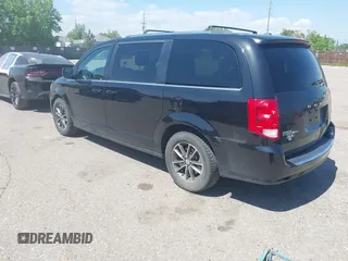 2018 Dodge Grand Caravan SXT z VIN 2C4RDGCG2JR343705, wystawiony jako IAAI lot #42324266 z przebiegiem 170 018 mil mil oraz . Historia ofert i sprzedaży dostępna na DreamBid. Obrazek 3.