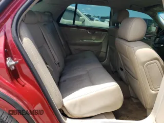 2006 Cadillac DTS 1SC z VIN 1G6KD57Y86U126357, wystawiony jako Copart lot #55745465 z przebiegiem 118 200 mil mil oraz Szkoda całkowita • Salvage title. Historia ofert i sprzedaży dostępna na DreamBid. Obrazek 10.