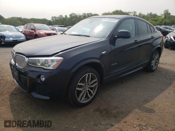 2015 BMW X4 xDrive35i with VIN 5UXXW5C59F0E87517, listed as a Copart auction lot 59604445 with 185,064 mi miles and Salvage title. Bid and sale history available at DreamBid. Image 1.