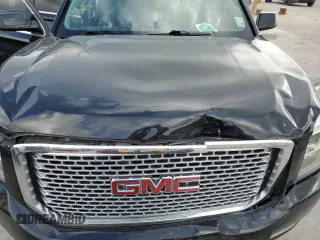 2017 GMC Yukon Denali with VIN 1GKS1CKJ7HR261831, listed as a Copart auction lot 79091724 with 156,082 mi miles and Salvage Title. Bid and sale history available at carsss.com. Image 12.