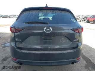 2019 Mazda CX-5 Touring with VIN JM3KFACMXK0686957, listed as a IAAI auction lot 41720338 with 95,421 mi miles. Bid and sale history available at carsss.com. Image 17.