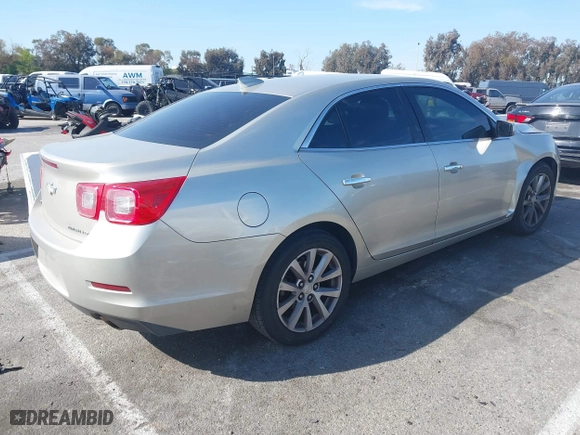 2015 Chevrolet Malibu LTZ with VIN 1G11F5SL0FF336477, listed as a IAAI auction lot 41844225 with 121,384 mi miles. Bid and sale history available at carsss.com. Image 4.