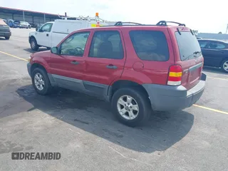 2006 Ford Escape XLT with VIN 1FMYU03136KD09448, listed as a IAAI auction lot 42578120 with 235,521 mi miles and . Bid and sale history available at DreamBid. Image 3.