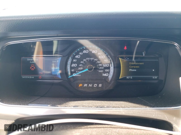 2015 Ford Taurus SEL with VIN 1FAHP2E90FG148821, listed as a Copart auction lot 77557384 with 141,514 mi miles and Salvage Title. Bid and sale history available at DreamBid. Image 9.