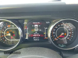 2023 Jeep Wrangler Sport z VIN 1C4HJXDG0PW582947, wystawiony jako IAAI lot #41932930 z przebiegiem 19 670 mil mil oraz . Historia ofert i sprzedaży dostępna na DreamBid. Obrazek 7.
