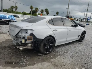 2023 Genesis G70 2.0T with VIN KMTG34TA3PU114905, listed as a Copart auction lot 61777435 with 26,493 mi miles and Salvage title. Bid and sale history available at DreamBid. Image 3.