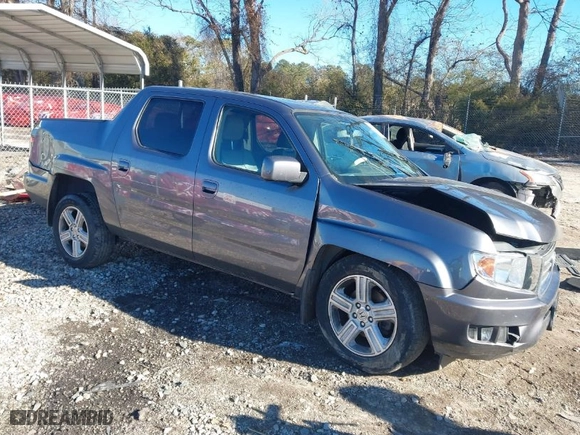 2014 Honda Ridgeline RTL with VIN 5FPYK1F52EB002984, listed as a IAAI auction lot 41347361 with 162,015 mi miles. Bid and sale history available at carsss.com. Image 1.