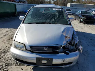 1997 Honda Odyssey with VIN RA11239041, listed as a Copart auction lot 85819024 with 79,952 mi miles and Salvage title. Bid and sale history available at DreamBid. Image 5.
