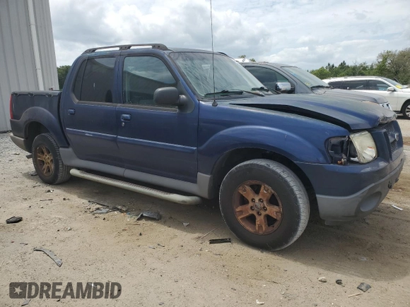 2005 Ford Explorer Sport Trac XLS with VIN 1FMDU67K95UB80915, listed as a Copart auction lot 54672085 with 182,683 mi miles and Salvage title. Bid and sale history available at DreamBid. Image 4.