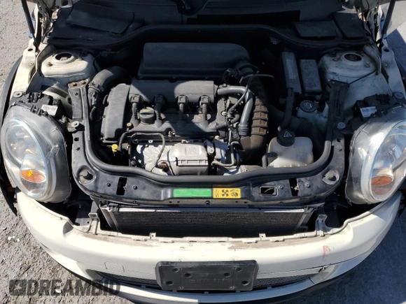 2009 MINI Hardtop S with VIN WMWMF73559TW83208, listed as a Copart auction lot 57347015 with 76,898 mi miles and Salvage title. Bid and sale history available at DreamBid. Image 11.