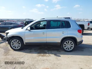 2013 Volkswagen Tiguan SE with VIN WVGAV7AX4DW545658, listed as a IAAI auction lot 41523168 with 188,729 mi miles and . Bid and sale history available at DreamBid. Image 15.