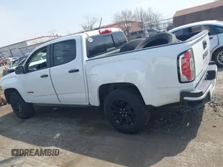2021 GMC Canyon 4WD AT4 z VIN 1GTG6FENXM1291689, wystawiony jako IAAI lot #42038884 z przebiegiem 54 884 mil mil oraz . Historia ofert i sprzedaży dostępna na DreamBid. Obrazek 14.