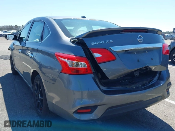 2018 Nissan Sentra SV with VIN 3N1AB7AP3JL633148, listed as a IAAI auction lot 41983588 with 148,479 mi miles and . Bid and sale history available at DreamBid. Image 3.