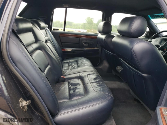 1997 Cadillac DeVille with VIN 1G6KD54Y2VU300250, listed as a Copart auction lot 66253444 with 0 mi miles and Clean Title. Bid and sale history available at carsss.com. Image 10.