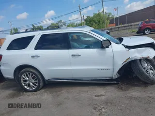 2014 Dodge Durango Citadel z VIN 1C4RDJEG9EC455930, wystawiony jako IAAI lot #42423167 z przebiegiem Nie podano mil oraz . Historia ofert i sprzedaży dostępna na DreamBid. Obrazek 12.