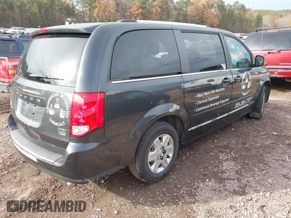 2011 Dodge Grand Caravan Crew with VIN 2D4RN5DG7BR763707, listed as a IAAI auction lot 41087199 with 230,637 mi miles and . Bid and sale history available at DreamBid. Image 4.
