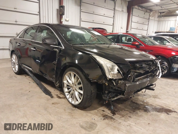 2014 Cadillac XTS Platinum with VIN 2G61W5S88E9186969, listed as a IAAI auction lot 41422872 with 184,998 mi miles and . Bid and sale history available at DreamBid. Image 1.