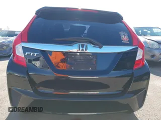 2015 Honda Fit EX-L z VIN 3HGGK5H81FM705199, wystawiony jako IAAI lot #42310099 z przebiegiem Nie podano mil oraz . Historia ofert i sprzedaży dostępna na DreamBid. Obrazek 16.
