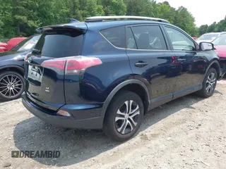 2017 Toyota RAV4 LE with VIN JTMBFREV5HJ173180, listed as a IAAI auction lot 42402753 with 97,917 mi miles and . Bid and sale history available at DreamBid. Image 4.