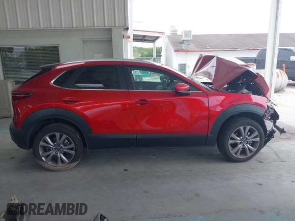 2023 Mazda CX-30 S Carbon Edition with VIN 3MVDMBCM3PM537841, listed as a IAAI auction lot 42080487 with 22,718 mi miles and . Bid and sale history available at DreamBid. Image 14.