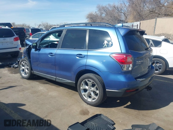 2018 Subaru Forester Touring z VIN JF2SJAWC5JH579570, wystawiony jako IAAI lot #41712344 z przebiegiem 102 251 mil mil oraz . Historia ofert i sprzedaży dostępna na DreamBid. Obrazek 3.