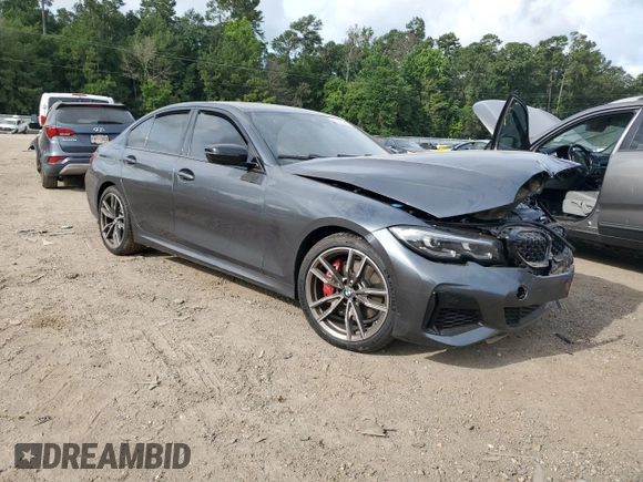 2022 BMW 3 Series M340i xDrive with VIN WBA5U9C02NFL65825, listed as a Copart auction lot 60244064 with 22,548 mi miles and Salvage Title. Bid and sale history available at DreamBid. Image 4.