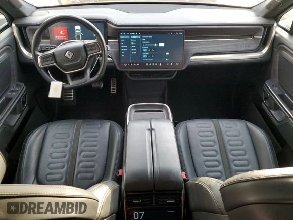 2022 Rivian R1T Adventure z VIN 7FCTGAAA9NN014280, wystawiony jako Copart lot #87908175 z przebiegiem 28 601 mil mil oraz Szkody całkowita. Historia ofert i sprzedaży dostępna na DreamBid. Obrazek 8.