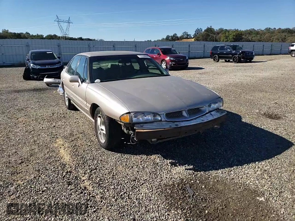 1999 Pontiac Bonneville SE z VIN 1G2HX52K4XH247855, wystawiony jako Copart lot #72559044 z przebiegiem 160 677 mil mil oraz Szkoda całkowita • Salvage title. Historia ofert i sprzedaży dostępna na DreamBid. Obrazek 10.