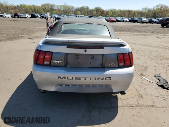 1999 Ford Mustang with VIN 1FAFP4448XF233101, listed as a Copart auction lot 54701005 with 54,585 mi miles and Salvage title. Bid and sale history available at DreamBid. Image 6.