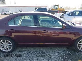 2011 Ford Fusion SEL with VIN 3FAHP0JA7BR220265, listed as a IAAI auction lot 42019909 with 170,287 mi miles. Bid and sale history available at carsss.com. Image 14.