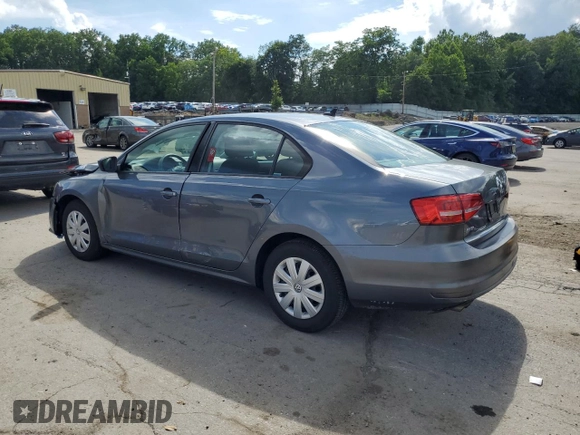 2015 Volkswagen Jetta S with VIN 3VW2K7AJ5FM327788, listed as a Copart auction lot 64034985 with 43,172 mi miles and Salvage title. Bid and sale history available at DreamBid. Image 2.
