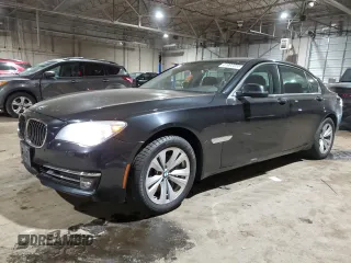 2015 BMW 7 Series 740Li xDrive with VIN WBAYF4C55FG291706, listed as a Copart auction lot 41992355 with 76,483 mi miles and Salvage Title. Bid and sale history available at carsss.com. Image 1.