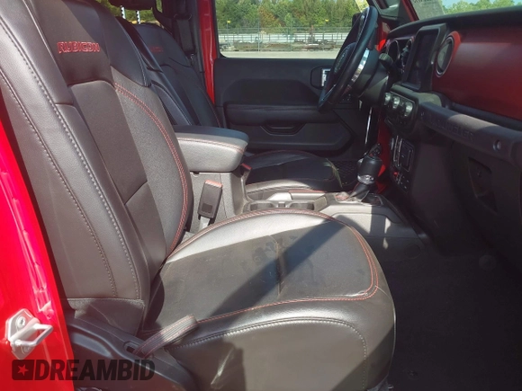2022 Jeep Wrangler Unlimited Rubicon with VIN 1C4HJXFG0NW100620, listed as a IAAI auction lot 42534993 with 21,614 mi miles and . Bid and sale history available at DreamBid. Image 5.