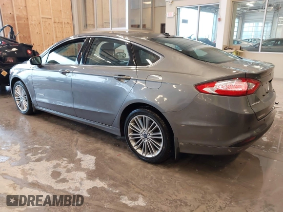 2014 Ford Fusion SE Hybrid with VIN 3FA6P0LU5ER310629, listed as a IAAI auction lot 41941852 with 53,739 mi miles. Bid and sale history available at carsss.com. Image 3.