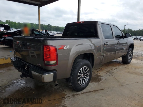 2012 GMC Sierra 1500 SLT with VIN 3GTP2WE74CG310914, listed as a Copart auction lot 56049905 with 106,882 mi miles and Salvage title. Bid and sale history available at DreamBid. Image 3.