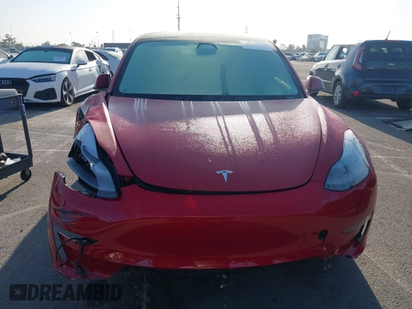 2021 Tesla Model 3 Long Range with VIN 5YJ3E1EB1MF071634, listed as a IAAI auction lot 41964321 with 39,596 mi miles. Bid and sale history available at carsss.com. Image 12.