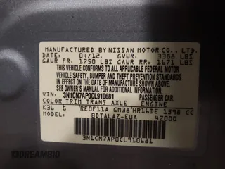 2012 Nissan Versa SV with VIN 3N1CN7AP0CL910681, listed as a IAAI auction lot 41405297 with 77,635 mi miles. Bid and sale history available at carsss.com. Image 9.