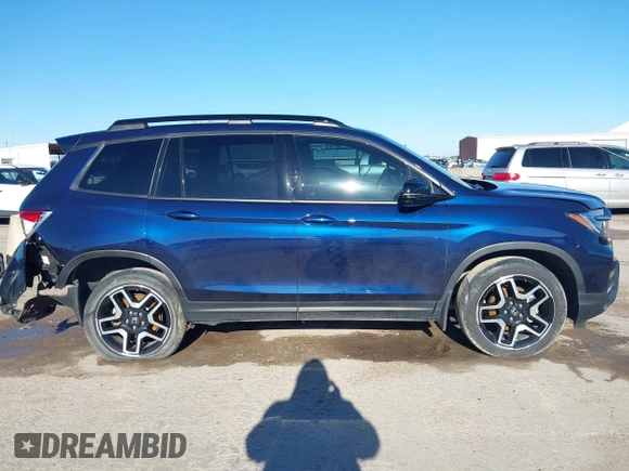 2023 Honda Passport Elite with VIN 5FNYF8H06PB012234, listed as a IAAI auction lot 41208146 with 38,491 mi miles and . Bid and sale history available at DreamBid. Image 13.